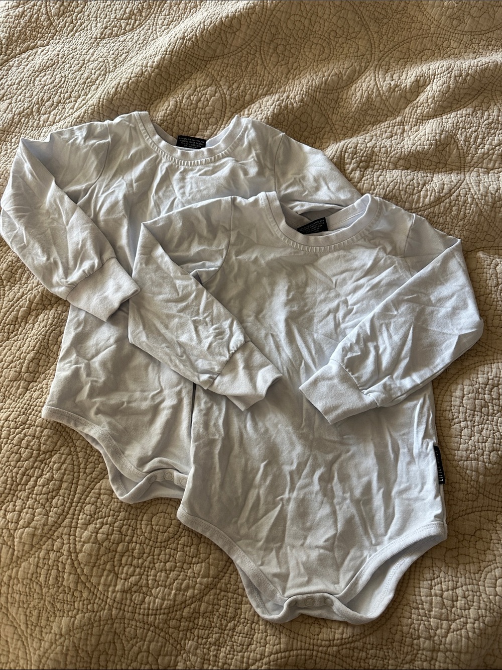 Little Bipsy White Long-Sleeve Baby Bodysuits - Set of 2